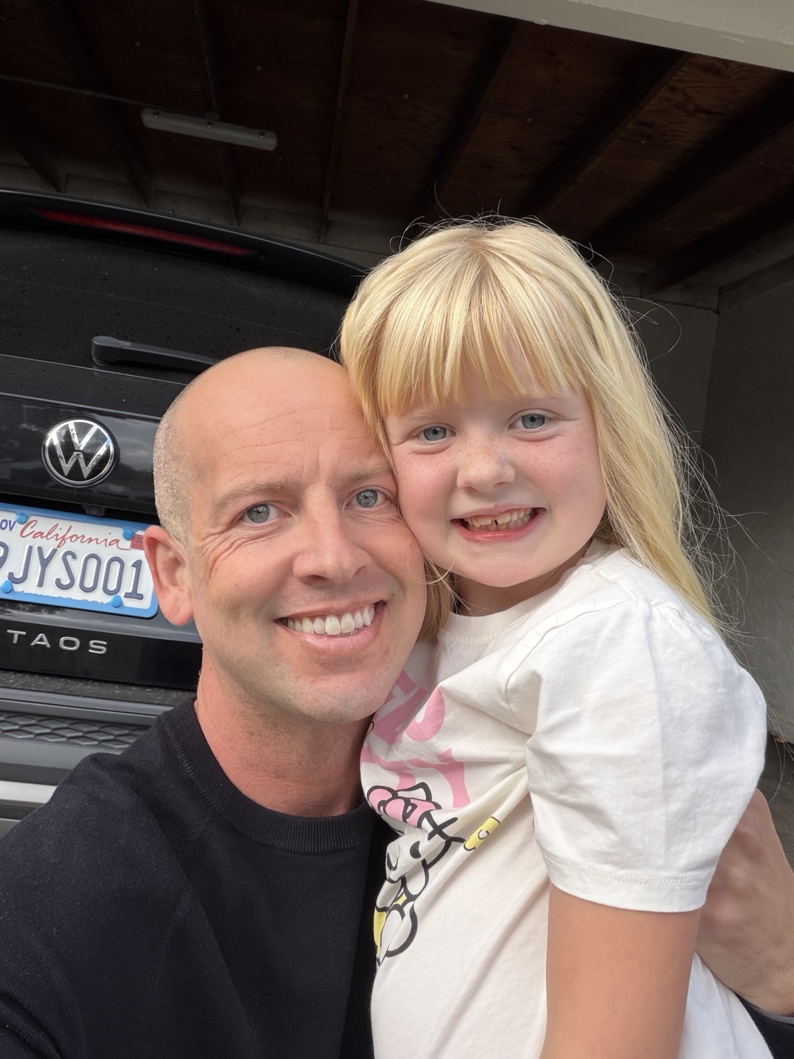 Tyler Barnett sharing a smile with his daughter